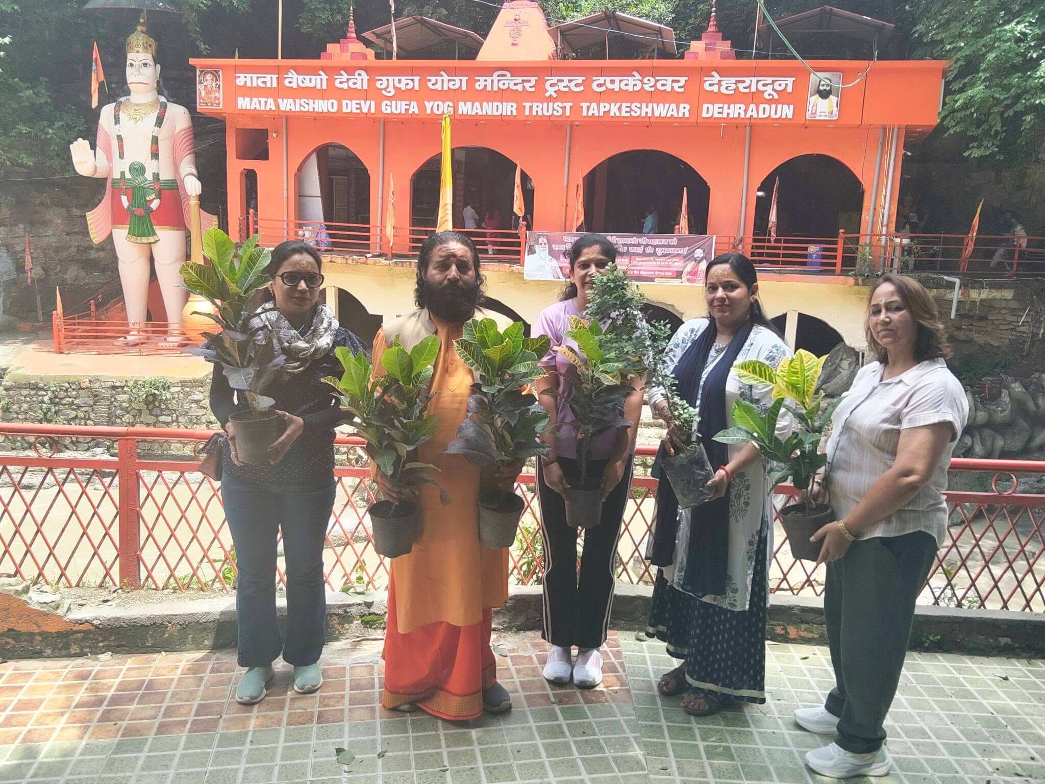 The founder guiding a gathering of devotees